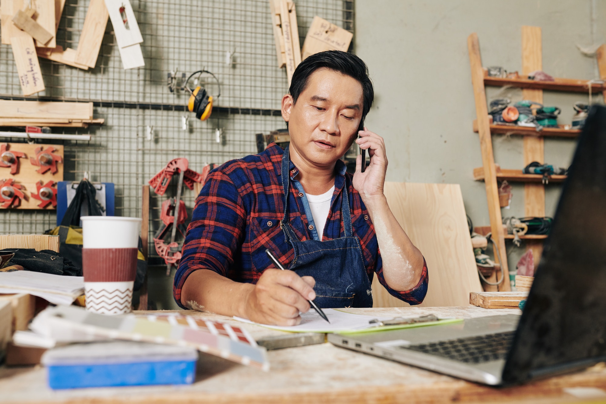 Carpenter working at desk